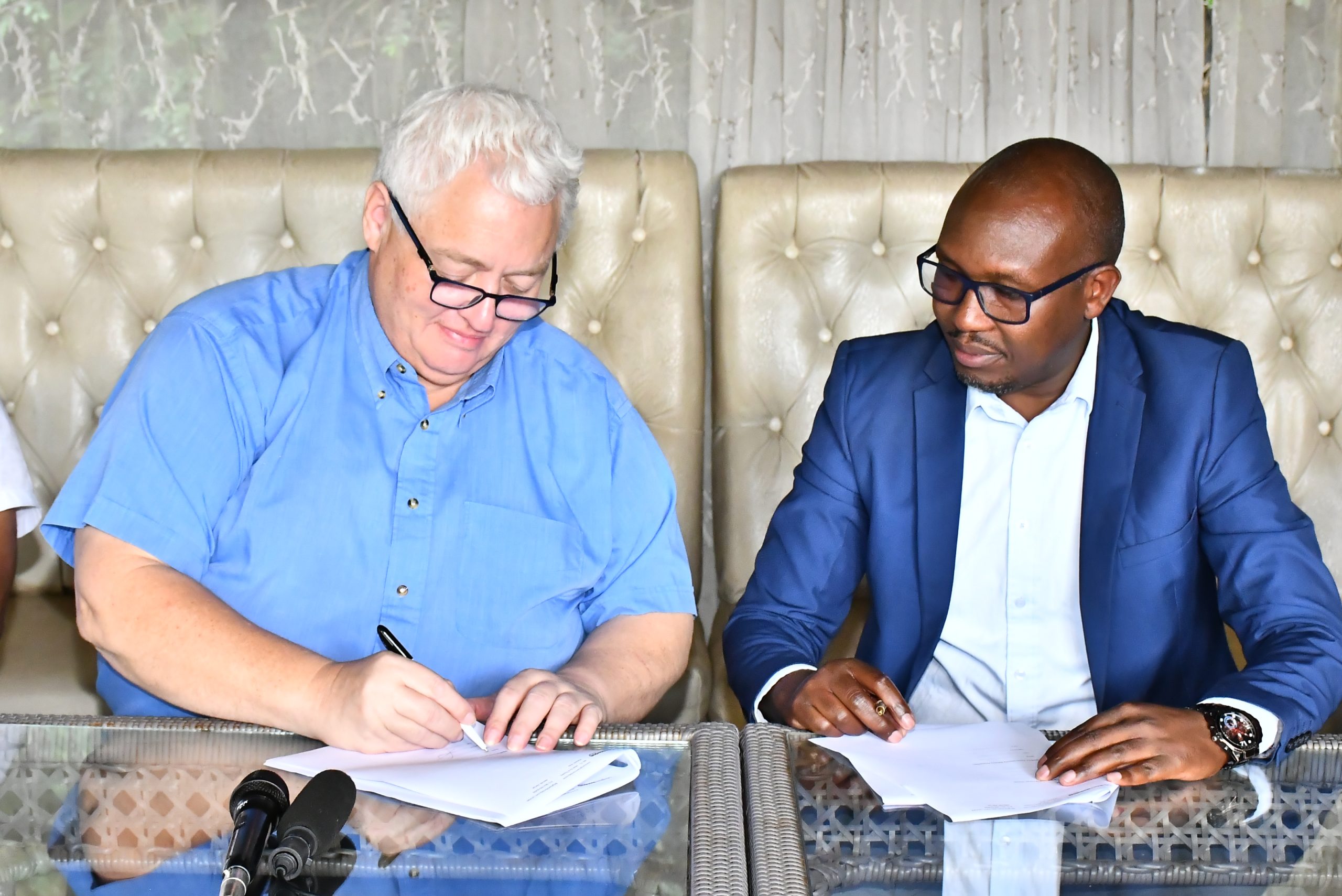 Jeremy van Tongeren, Chairman - Kenya Security Industry Association (KSIA), and Elecstima Onganga, Workforce Development Lead - BrighterMonday Kenya signing the the Memorandum of Understanding (MoU) between BrighterMonday Kenya and KSIA