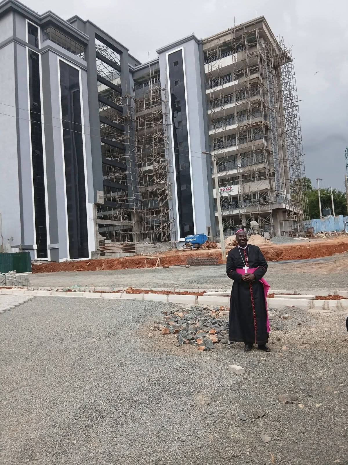 Bishop Dominic Kimengich outside the almost read St John Amani Centre.