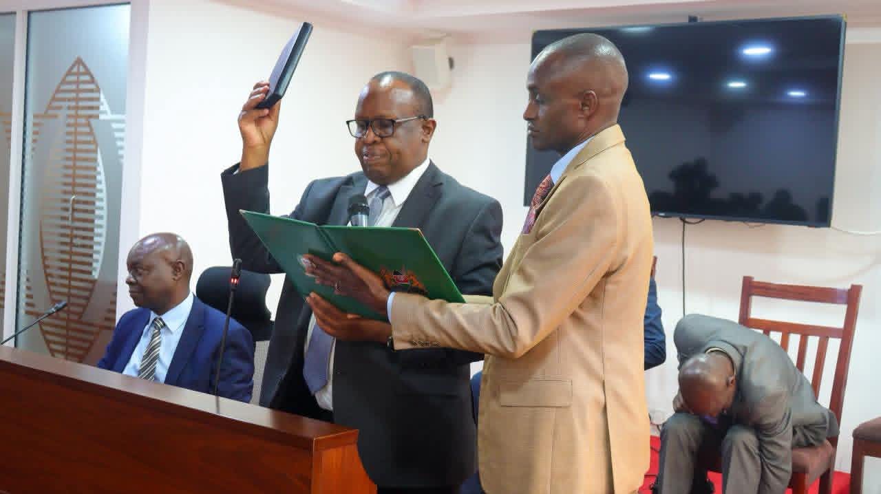 MTRH CEO Dr Phillip Kirwa takes oath before appearing before a parliamentary committee 