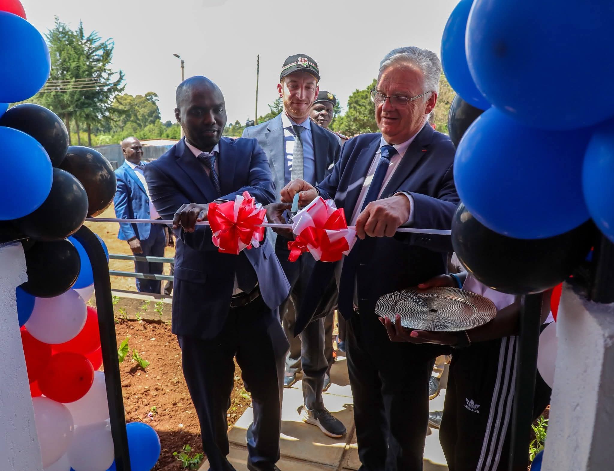Elgeyo Marakwet Governor Wisley Rotich with Miramas Mayor Frédéric Vigouroux during the opening of House of Coaches office in Iten