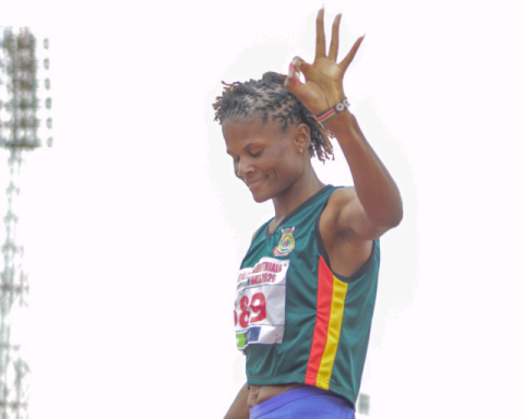 Lilian Odira gestures after winning national title for a third time in a row