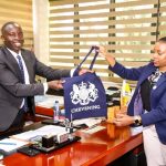 Governor Stephen Sang with representative from the British High Commission