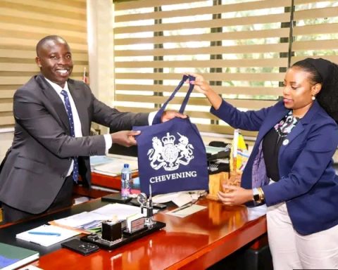 Governor Stephen Sang with representative from the British High Commission
