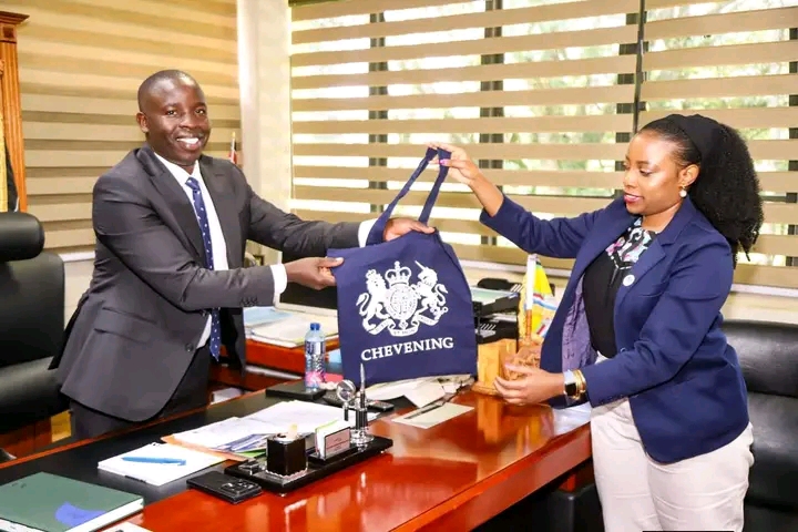 Governor Stephen Sang with representative from the British High Commission