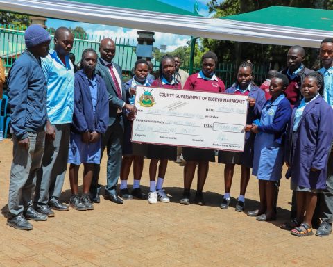 Elgeyo Marakwet Governor Wisley Rotich with some beneficiaries of the Ksh 73m bursary allocation