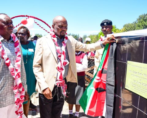MP Oscar Sudi and former MP Moses Kuria commisioning the Ngeria Girls swimming pool.
