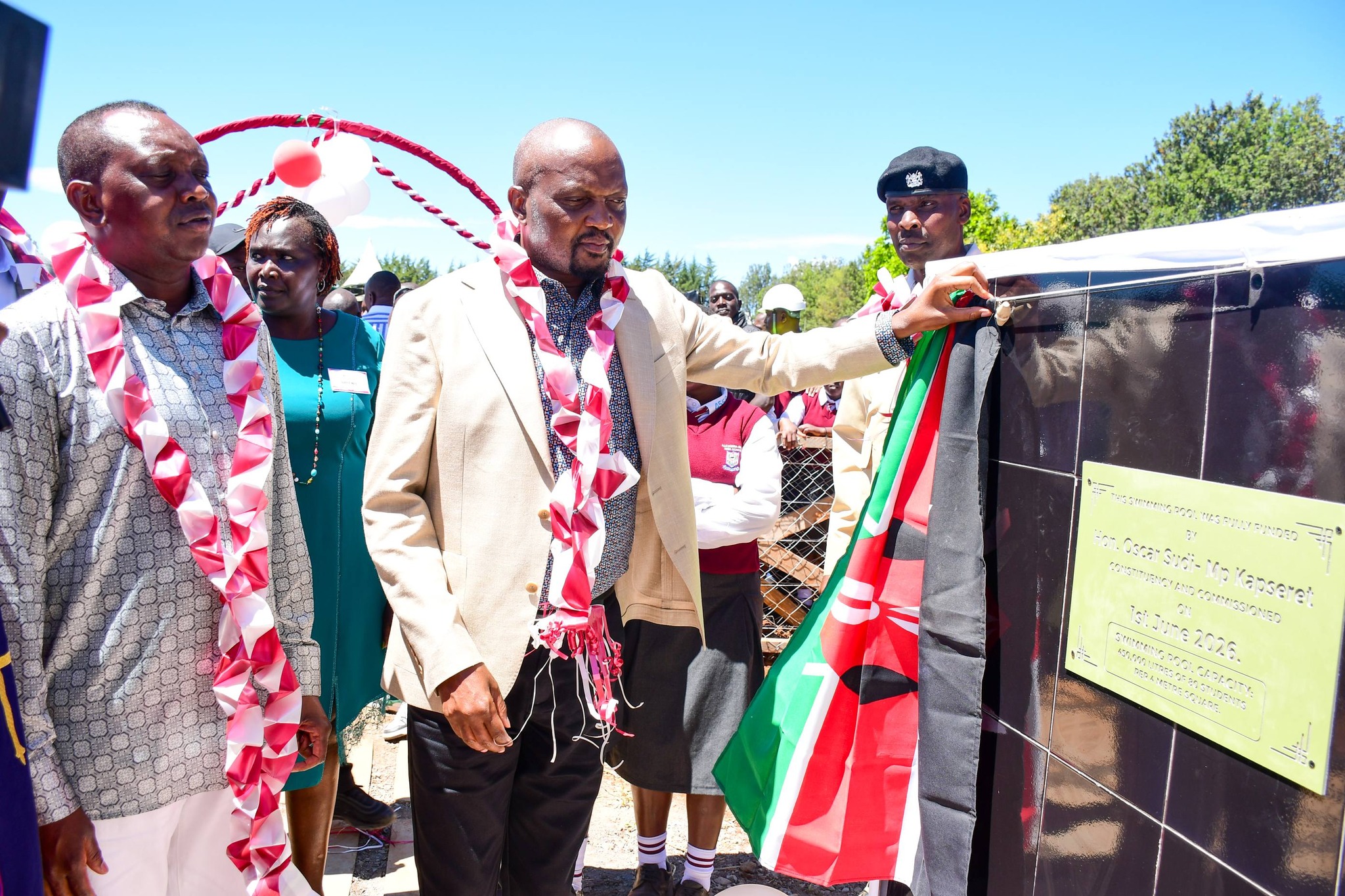 MP Oscar Sudi and former MP Moses Kuria commisioning the Ngeria Girls swimming pool.