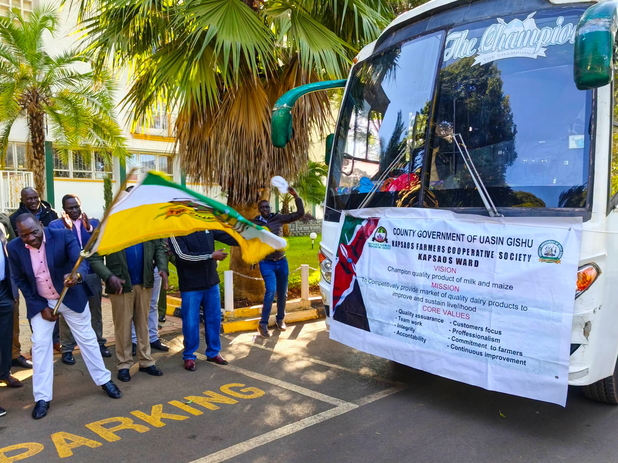 Governor Bii flagging off farmers for a dairy tour to Kiambu County.