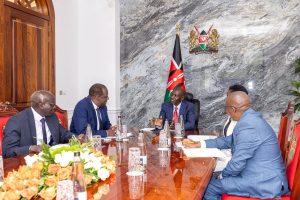 Ruto receiving brief on the progress the Financial Inclusion Fund, popularly known as the Hustler Fund.