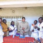 Health CS Aden Duale poses for a photo with staff at Sondany Dispensary in West Pokot County
