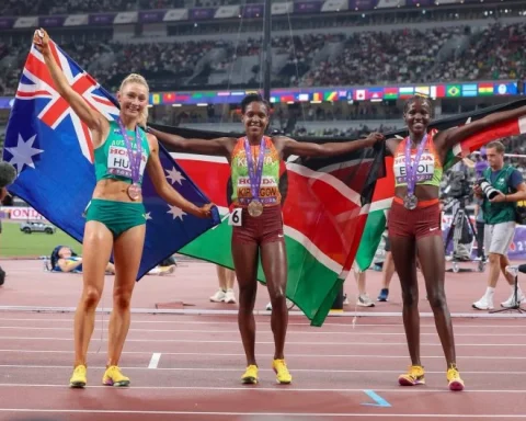 Australia’s Jess Hull with Kenya’s Faith Kipyegon and Dorcus Ewoi celebrate after the women’s 1500m final at the World Athletics Championships in Tokyo.