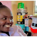 Mary Muigai showcasing the game-changing Solar Alert Security System