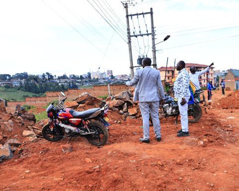 Governor Bii with Roads CEC member Abraham Serem during a visit to Pioneer estate
