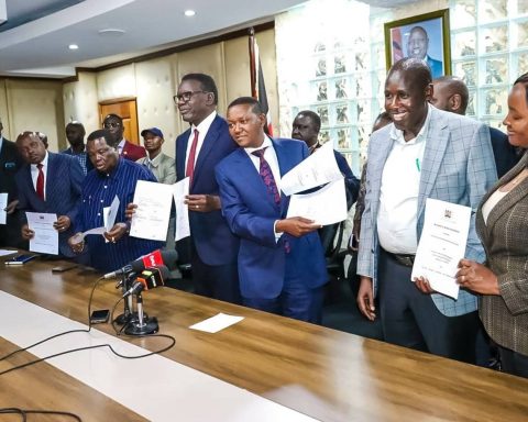 kenyan government officials with aviation workers union officials after reaching agreement
