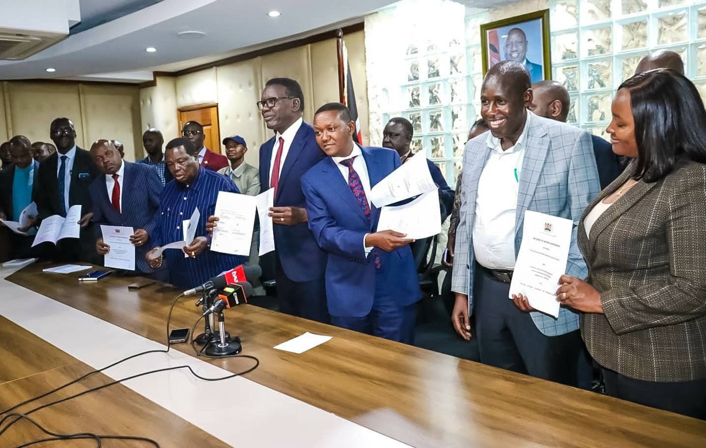 kenyan government officials with aviation workers union officials after reaching agreement