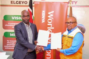 Elgeyo Marakwet Governor Wisley Rotich﻿ (left) with World Vision Interim National Director Dr Gershon Mwakazi.