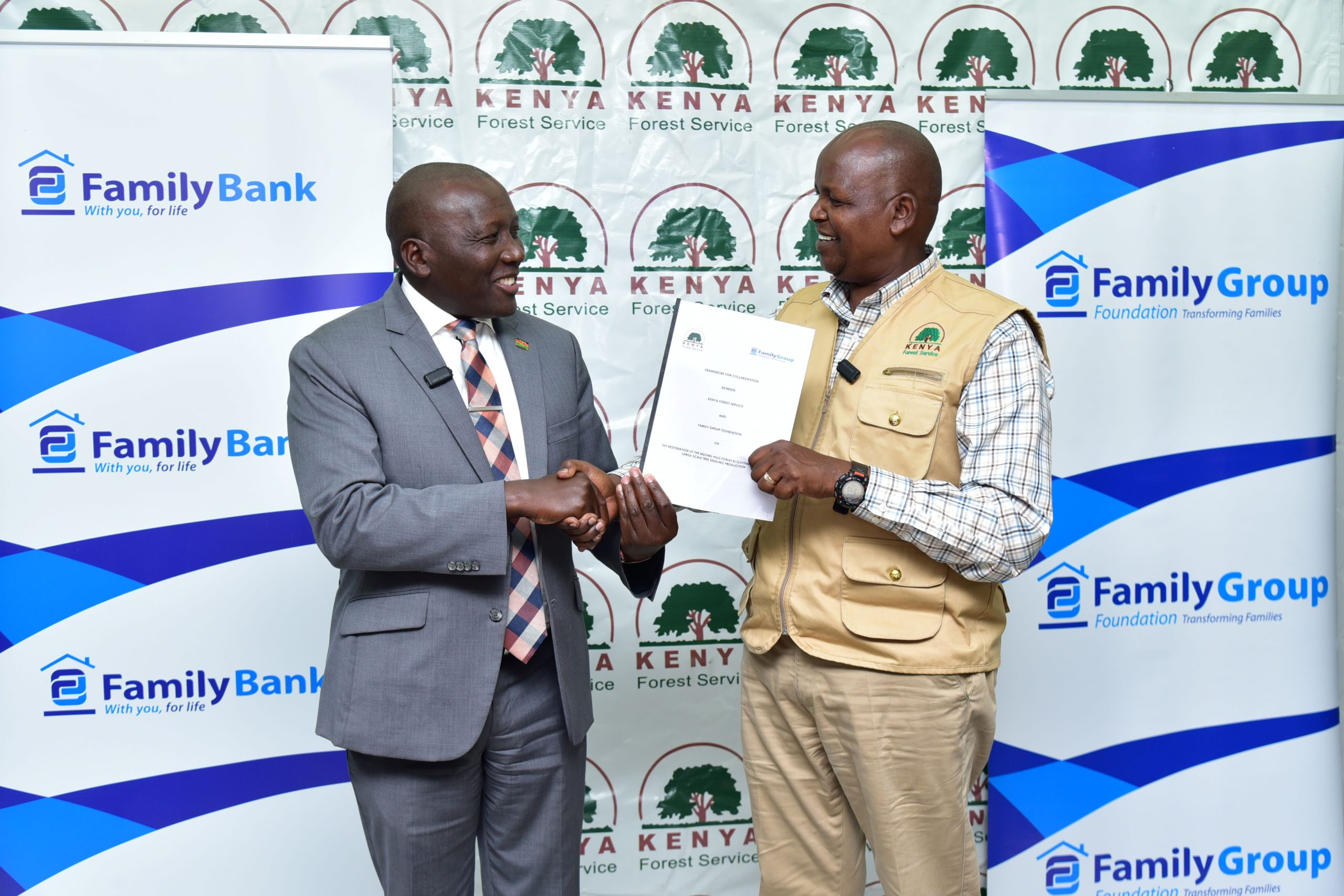Family Group Foundation Executive Director John Waimiri (left) with Kenya Forest Service Chief Conservator of Forests Alex Lemarkoko (right).