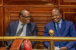 CS Kagwe (right) with Kenya Dairy Board (KDB) Managing Director Dr Kimutai Maritim in National Parliament.