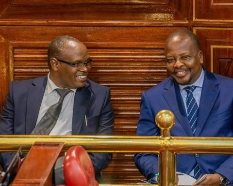 CS Kagwe (right) with Kenya Dairy Board (KDB) Managing Director Dr Kimutai Maritim in National Parliament.