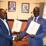 Kenya Union of Clinical Officers (KUCO) National Secretary General George Gibore with West Pokot Governor Simon Kachapin.