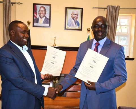 Kenya Union of Clinical Officers (KUCO) National Secretary General George Gibore with West Pokot Governor Simon Kachapin.