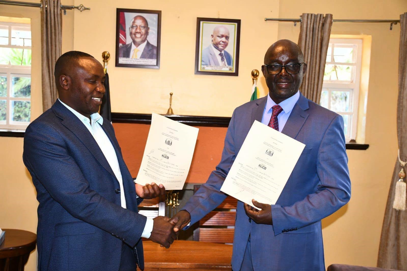 Kenya Union of Clinical Officers (KUCO) National Secretary General George Gibore with West Pokot Governor Simon Kachapin.