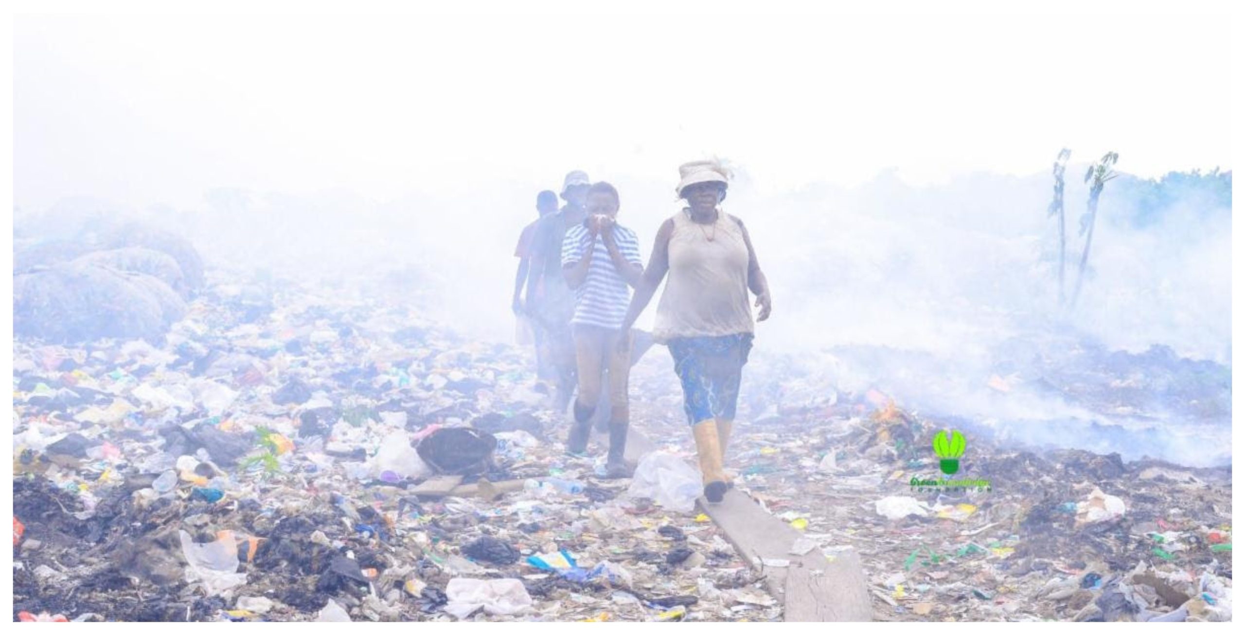 People walking in a land fill in Africa