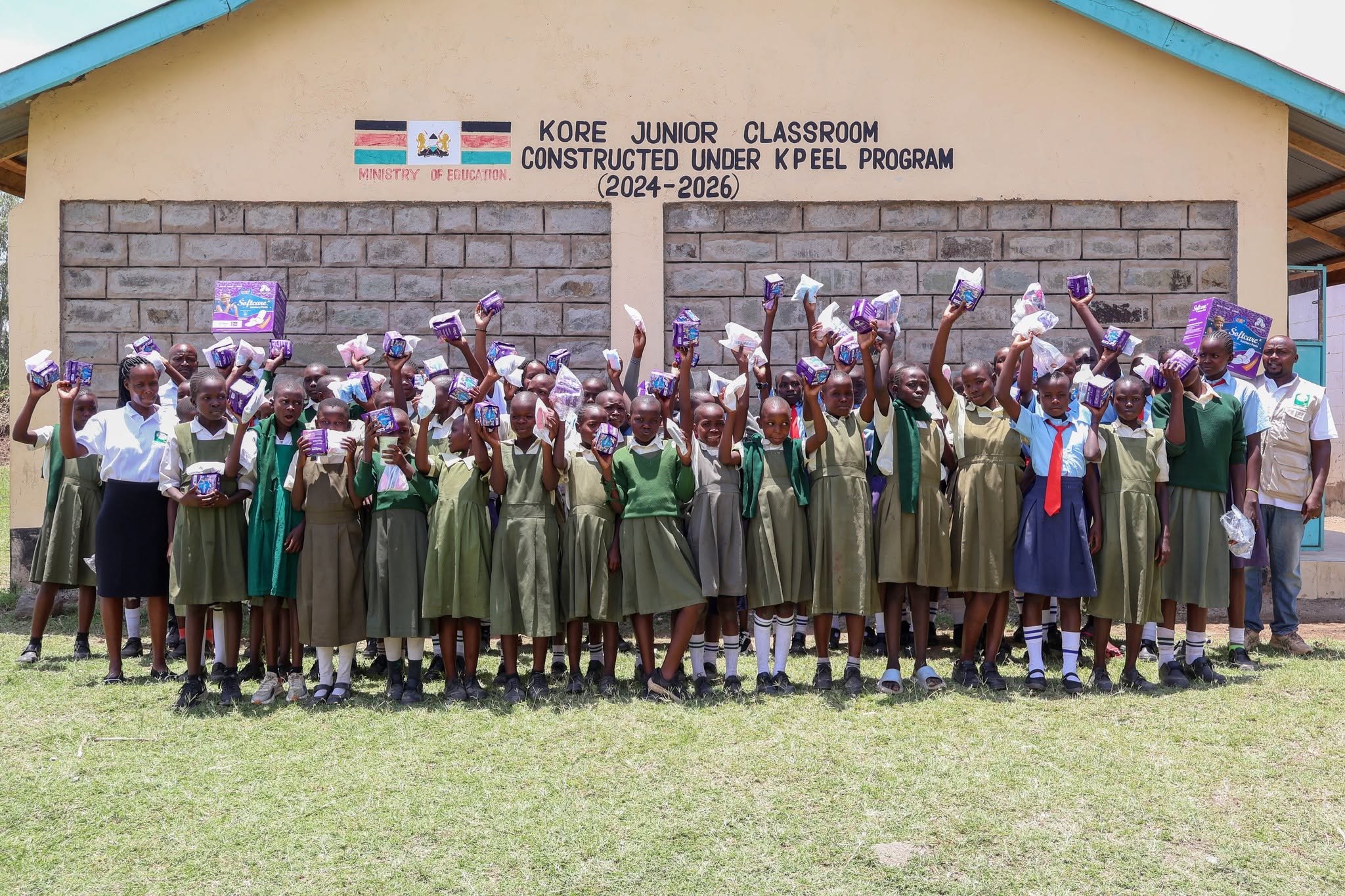 Rural Women Peace Link Donates Sanitary Pads to Kore Primary Girls Ahead of International Day of the Girl Child