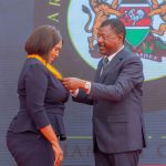 Speaker Wetang'ula presenting a medal to Nakuru Senator Tabitha Keroche Karanja.